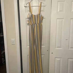 Brand new with tags yellow and gray jumpsuit.
